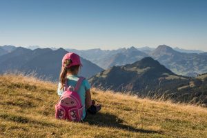 Little girl alone in the mountains